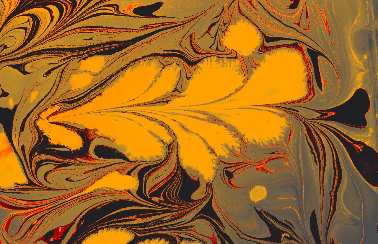 Vibrant abstract art featuring swirling patterns in yellow and black hues.